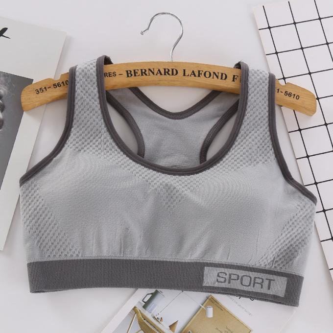 Camiseta de alças contínua à prova de choque de corrida da Rápido-secagem de Wicking do roupa interior da aptidão das mulheres do sutiã dos esportes da forma da cor de Macaron
