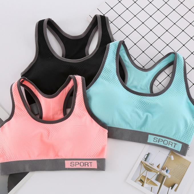 Camiseta de alças contínua à prova de choque de corrida da Rápido-secagem de Wicking do roupa interior da aptidão das mulheres do sutiã dos esportes da forma da cor de Macaron