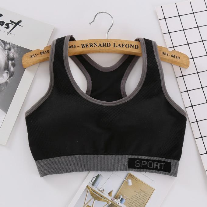 Camiseta de alças contínua à prova de choque de corrida da Rápido-secagem de Wicking do roupa interior da aptidão das mulheres do sutiã dos esportes da forma da cor de Macaron