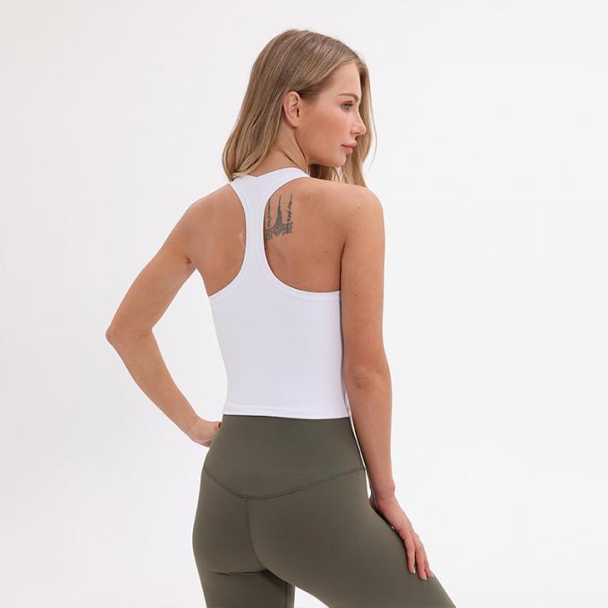 O sutiã Wirefree dos esportes do Longline das mulheres por atacado acolchoou das mulheres feitas sob encomenda da camiseta de alças do apoio médio a camiseta de alças branca da colheita