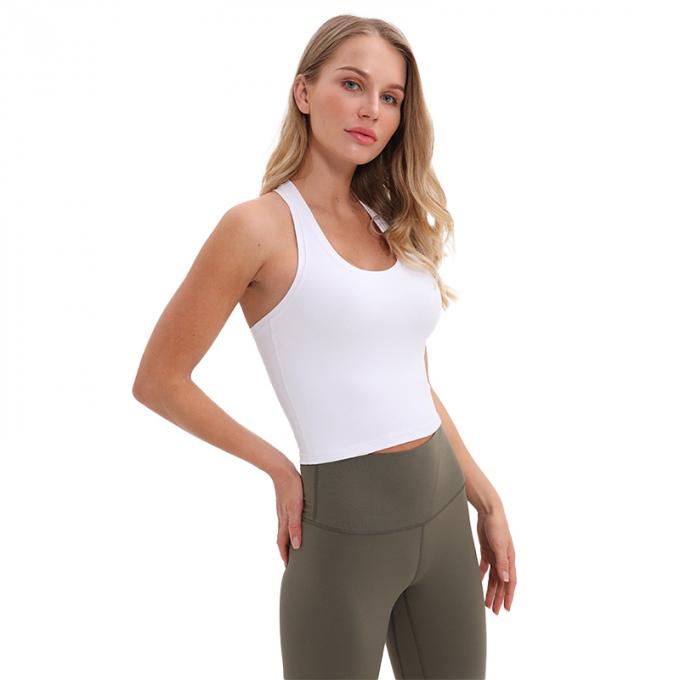 O sutiã Wirefree dos esportes do Longline das mulheres por atacado acolchoou das mulheres feitas sob encomenda da camiseta de alças do apoio médio a camiseta de alças branca da colheita