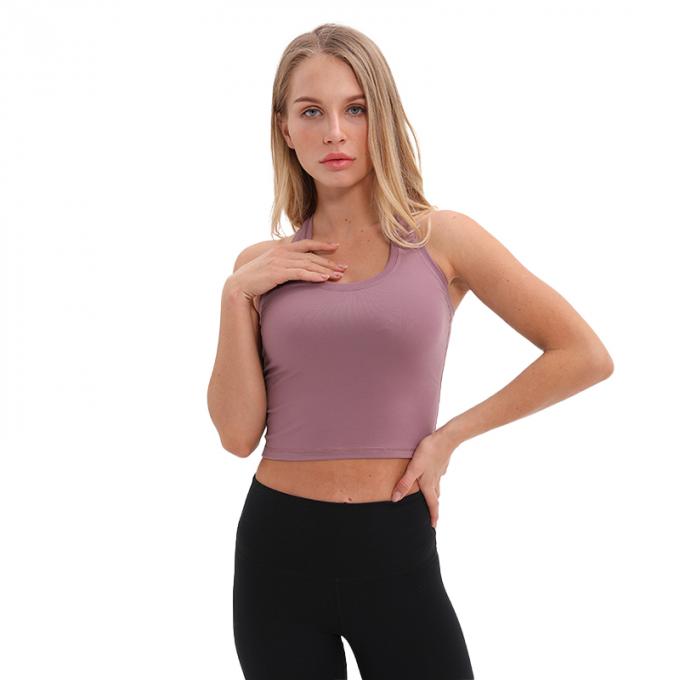 O sutiã Wirefree dos esportes do Longline das mulheres por atacado acolchoou das mulheres feitas sob encomenda da camiseta de alças do apoio médio a camiseta de alças branca da colheita