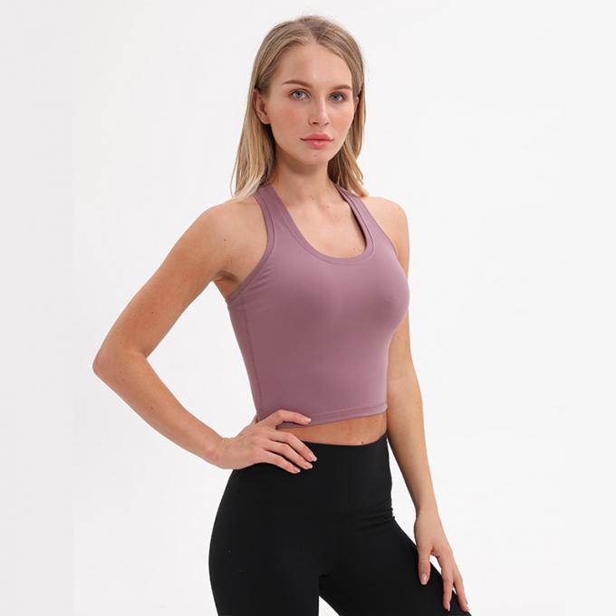 O sutiã Wirefree dos esportes do Longline das mulheres por atacado acolchoou das mulheres feitas sob encomenda da camiseta de alças do apoio médio a camiseta de alças branca da colheita
