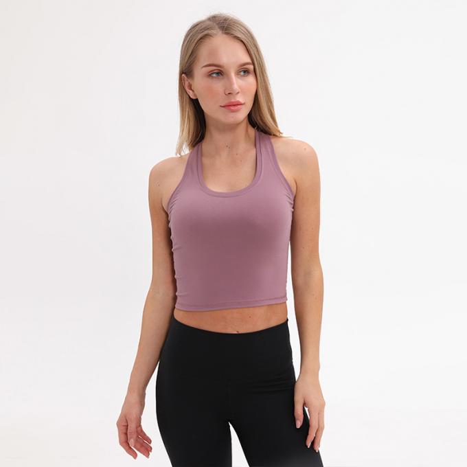 O sutiã Wirefree dos esportes do Longline das mulheres por atacado acolchoou das mulheres feitas sob encomenda da camiseta de alças do apoio médio a camiseta de alças branca da colheita