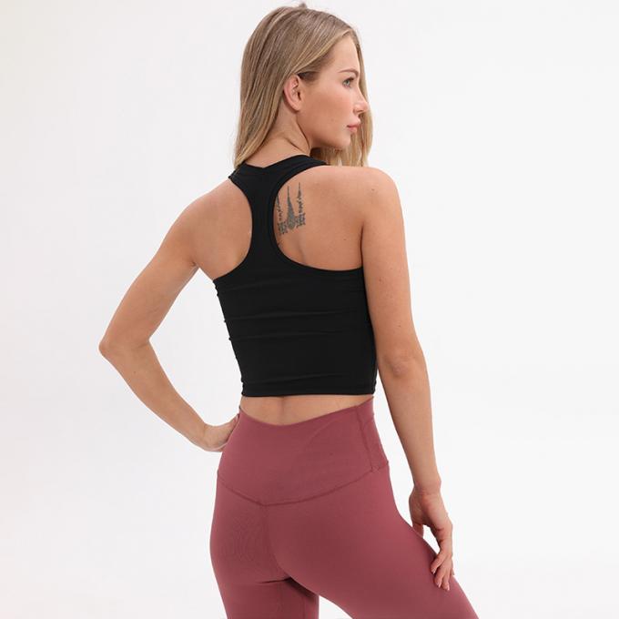 O sutiã Wirefree dos esportes do Longline das mulheres por atacado acolchoou das mulheres feitas sob encomenda da camiseta de alças do apoio médio a camiseta de alças branca da colheita