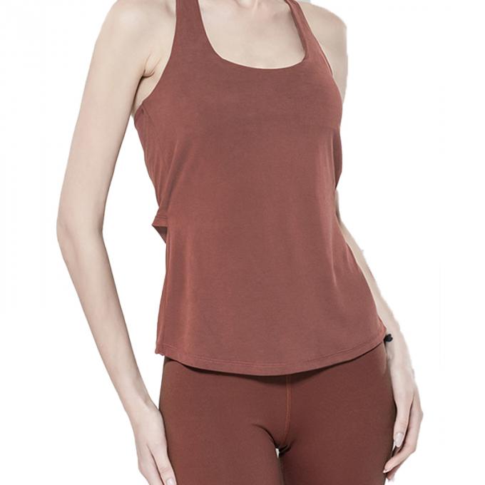 Os esportes por atacado investem a roupa da aptidão das mulheres que corre a beleza superior para trás ostentam a parte superior fraca superior da ioga com sutiã