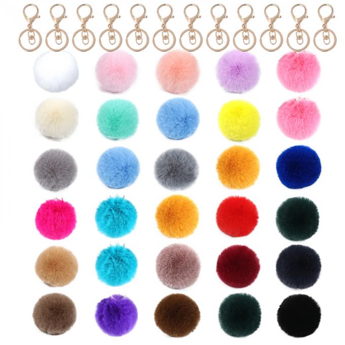 O saco macio por atacado do carro dos acessórios da corrente chave de Pom Pom Keychain Artificial Fur Ball encanta a pele Pom Keychain
