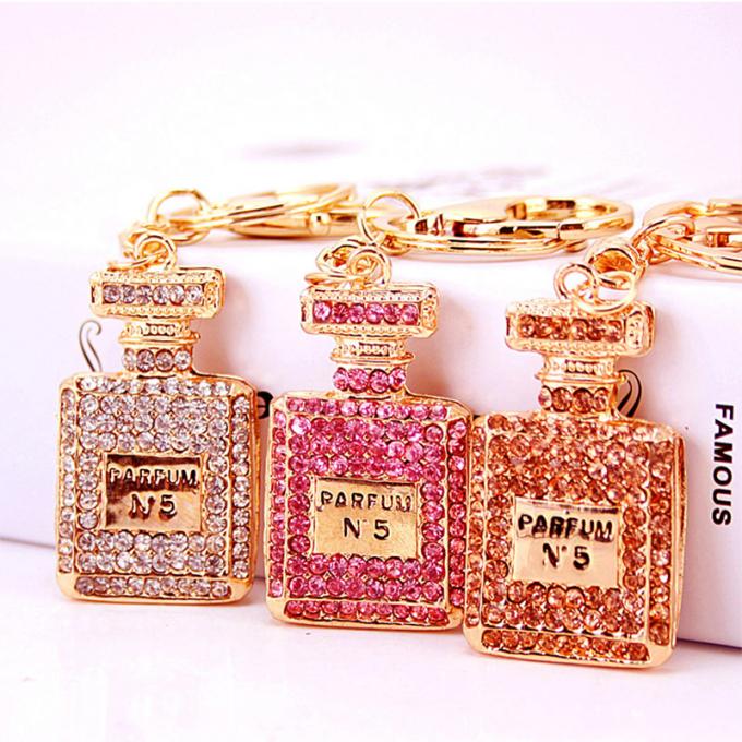 As senhoras Diamante-enchidas criativas perfumam o metal fêmea Crystal Keychain do cristal de rocha dos acessórios do saco da corrente chave de garrafa