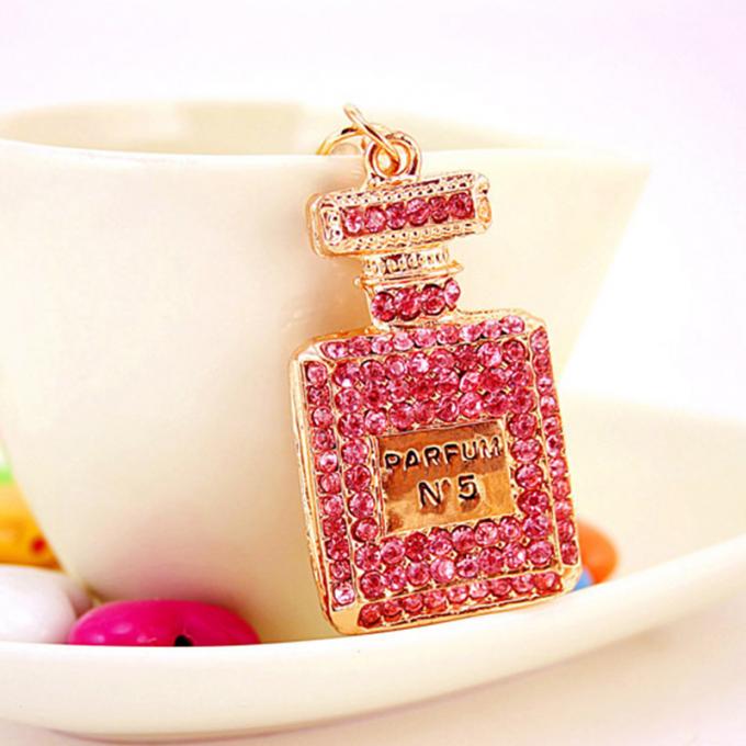 As senhoras Diamante-enchidas criativas perfumam o metal fêmea Crystal Keychain do cristal de rocha dos acessórios do saco da corrente chave de garrafa