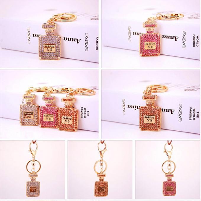 As senhoras Diamante-enchidas criativas perfumam o metal fêmea Crystal Keychain do cristal de rocha dos acessórios do saco da corrente chave de garrafa