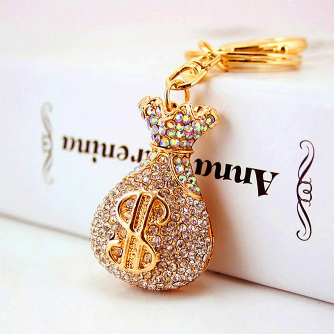 Acessórios por atacado Keyhains de Diamond Crystal Money Bag Car Key Ring Metal Pendant Women Bag para presentes
