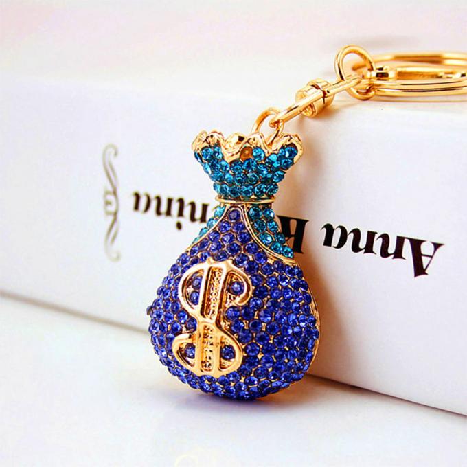 Acessórios por atacado Keyhains de Diamond Crystal Money Bag Car Key Ring Metal Pendant Women Bag para presentes
