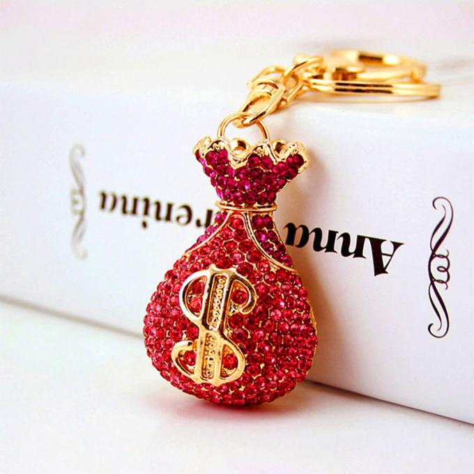 Acessórios por atacado Keyhains de Diamond Crystal Money Bag Car Key Ring Metal Pendant Women Bag para presentes