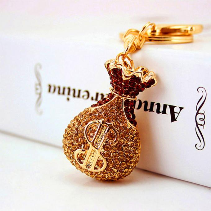 Acessórios por atacado Keyhains de Diamond Crystal Money Bag Car Key Ring Metal Pendant Women Bag para presentes