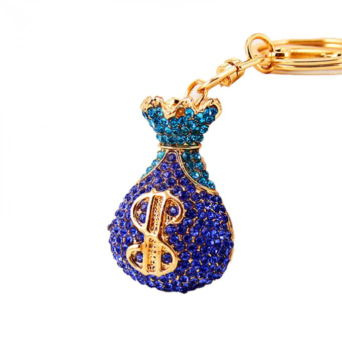 Acessórios por atacado Keyhains de Diamond Crystal Money Bag Car Key Ring Metal Pendant Women Bag para presentes
